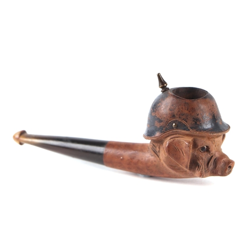 852 - A World War I French carved walnut and horn propaganda caricature smoking pipe, modelled as a pig we... 