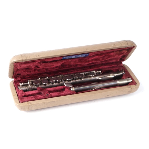 861 - A silver plated piccolo, cased.