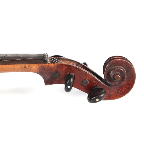 862 - A one-piece back violin in a wooden case, 54cms long.