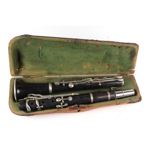 867 - A Jul. Heinr Zimmermann clarinet in a pine case.