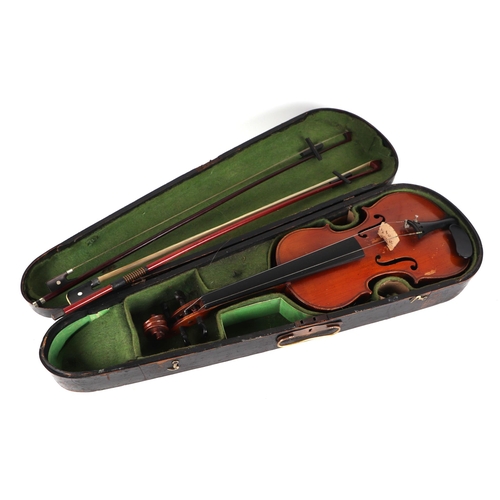 870 - A one-piece back violin and two bows, 55cms long, in a pine case .