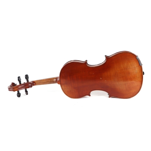 870 - A one-piece back violin and two bows, 55cms long, in a pine case .