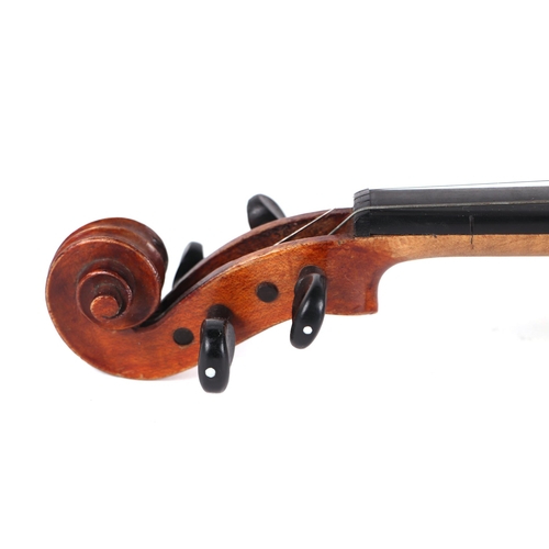 870 - A one-piece back violin and two bows, 55cms long, in a pine case .