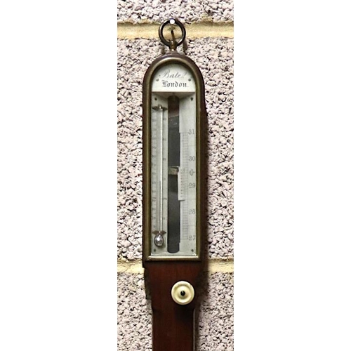 881 - A 19th century Bates of London mahogany and brass ship's stick barometer, 97cms high.Condition Repor... 