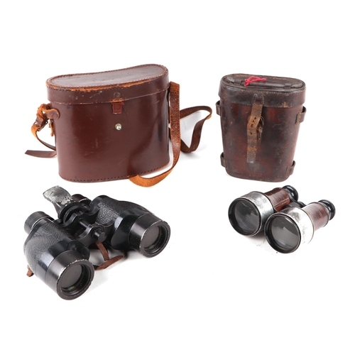 886 - A pair of early 20th century racing binoculars in a leather case dated 1907; together with a pair of... 