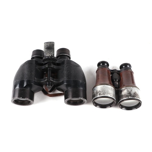 886 - A pair of early 20th century racing binoculars in a leather case dated 1907; together with a pair of... 