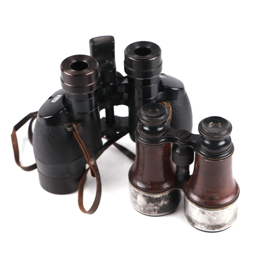 886 - A pair of early 20th century racing binoculars in a leather case dated 1907; together with a pair of... 