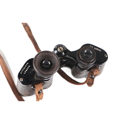 887 - A pair of Negretti & Zambra racing binoculars, cased; together with a pair of Atkinson London The Lu... 