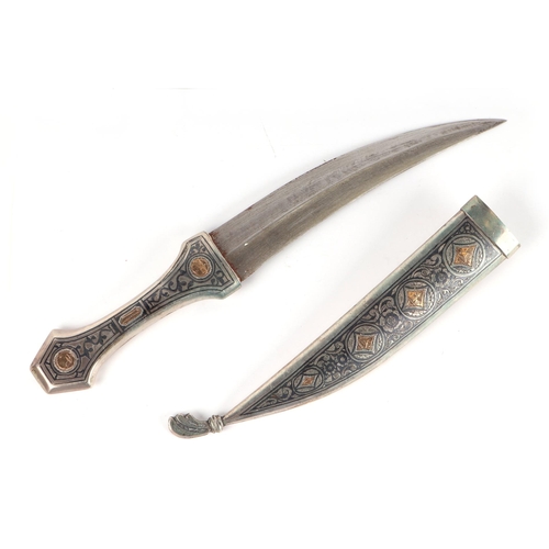 89 - An Iraqi Marsh Arab white metal (silver) niello and yellow metal inlaid dagger, 33cms long