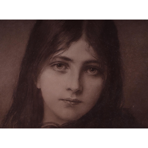 953 - A sepia photographic print depicting a young girl, framed & glazed, 27 by 36cms.