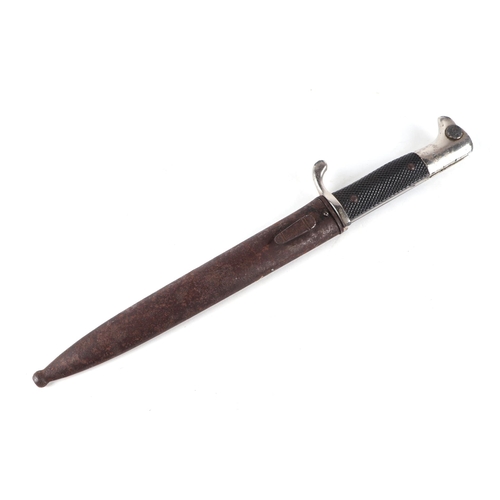 96 - A Third Reich plated dress bayonet by Eickhorn in its steel scabbard. Marked on the ricasso: ORIGINA... 