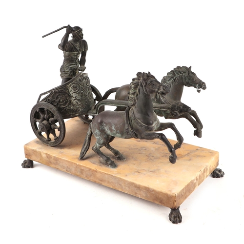 964 - After the antique:  A bronze figural group depicting a Roman chariot being pulled by a pair of horse... 