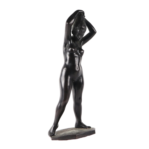 997 - A mid 20th century bronzed study of a standing female nude, 34cms high.