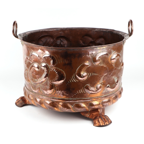 1993 - A large Victorian copper two-handled log bin on three paw feet, 45cms diameter.