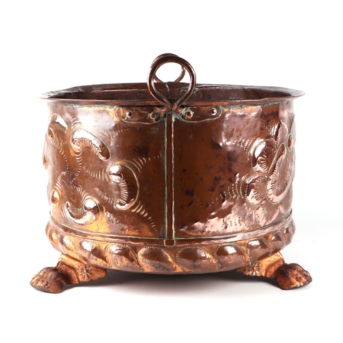 1993 - A large Victorian copper two-handled log bin on three paw feet, 45cms diameter.