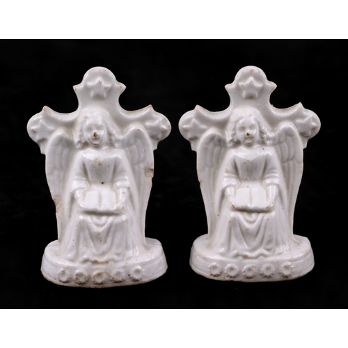 1978A - A pair of rare Chinese Dehua blanc de Chine crucifix figures. 8cn high (2)