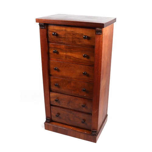 2069 - A 19th century walnut Wellington chest with an arrangement of six drawers, on a plinth base, 56cms w... 