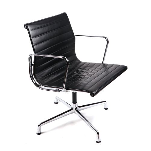 2072 - A Vitra Charles and Ray Eames EA108 aluminium group leather armchair.