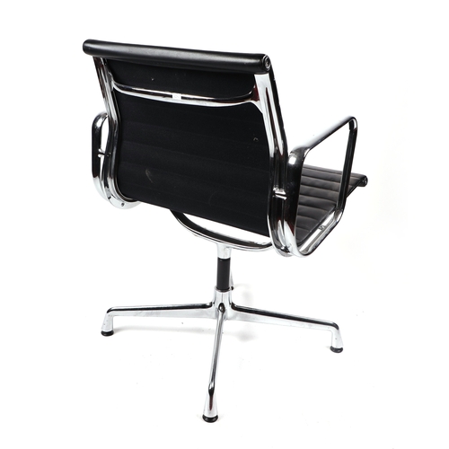 2073 - A Vitra Charles and Ray Eames EA108 aluminium group leather armchair.