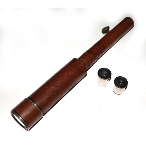 882 - F Davidson & Co, Davon patent leather wrapped telescope, with additional variable magnifying eye pie... 