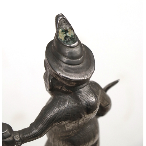 1572 - A public house figural bar lighter in the form of Mr Punch holding a feather quill, 23cm high