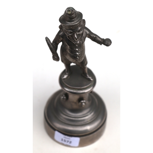 1572 - A public house figural bar lighter in the form of Mr Punch holding a feather quill, 23cm high