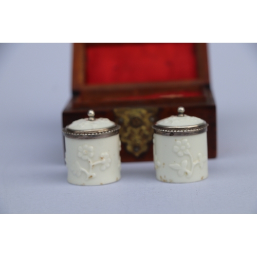 1397 - A pair of 18th century French Saint Cloud porcelain silver mounted miniature tobacco jars and covers... 