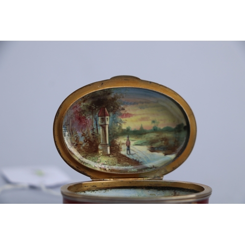 1567 - A continental (Austrian) oval enamel box decorated with figures and landscapes within panels with gi... 