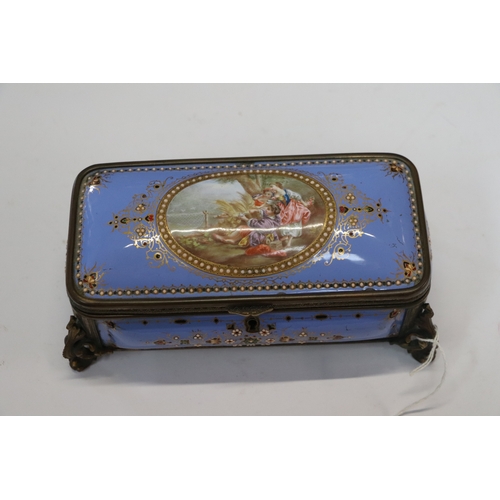 1574 - A 19th century French enamel and ormolu mounted trinket box with blue ground and jewelling, the top ... 