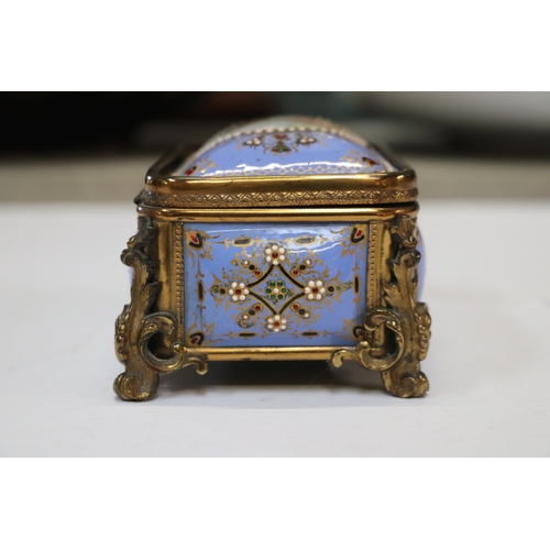 1575 - A 19th century French enamel and ormolu mounted trinket box with blue ground and jewelling, the top ... 