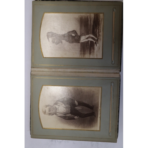 750 - A late Victorian Indian photograph album containing photographic postcards depicting caricatures of ... 