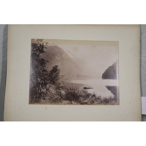 748 - A late Victorian albumen album containing images of New Zealand, sixty eight 20 by 15cms images, the... 