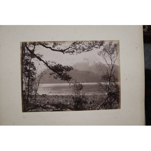 748 - A late Victorian albumen album containing images of New Zealand, sixty eight 20 by 15cms images, the... 