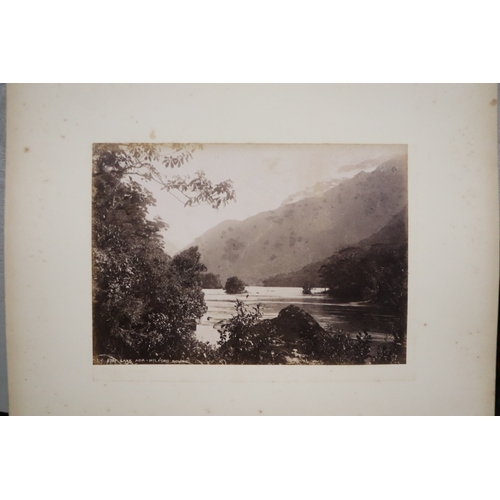 748 - A late Victorian albumen album containing images of New Zealand, sixty eight 20 by 15cms images, the... 