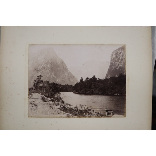 748 - A late Victorian albumen album containing images of New Zealand, sixty eight 20 by 15cms images, the... 