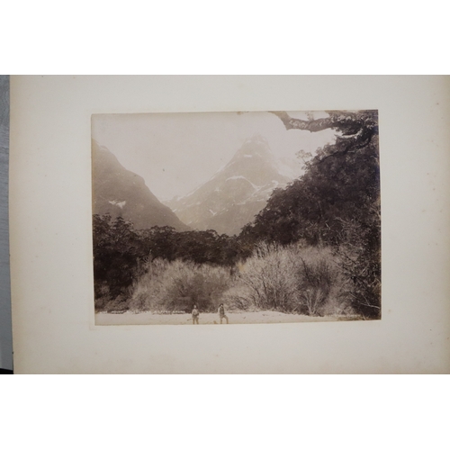 748 - A late Victorian albumen album containing images of New Zealand, sixty eight 20 by 15cms images, the... 