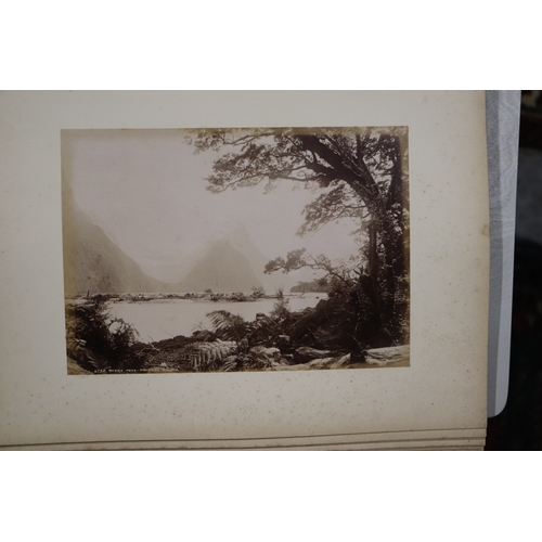 748 - A late Victorian albumen album containing images of New Zealand, sixty eight 20 by 15cms images, the... 