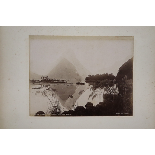 748 - A late Victorian albumen album containing images of New Zealand, sixty eight 20 by 15cms images, the... 