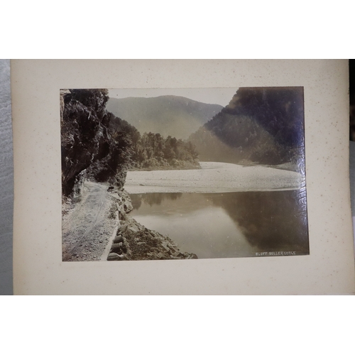 748 - A late Victorian albumen album containing images of New Zealand, sixty eight 20 by 15cms images, the... 