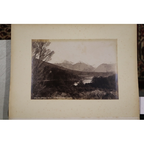 748 - A late Victorian albumen album containing images of New Zealand, sixty eight 20 by 15cms images, the... 