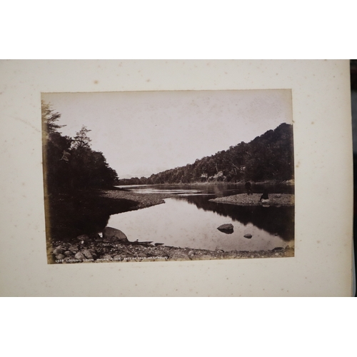 748 - A late Victorian albumen album containing images of New Zealand, sixty eight 20 by 15cms images, the... 