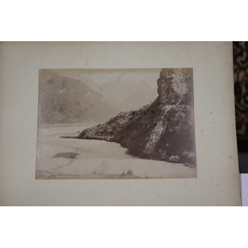 748 - A late Victorian albumen album containing images of New Zealand, sixty eight 20 by 15cms images, the... 