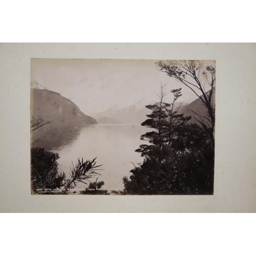 748 - A late Victorian albumen album containing images of New Zealand, sixty eight 20 by 15cms images, the... 