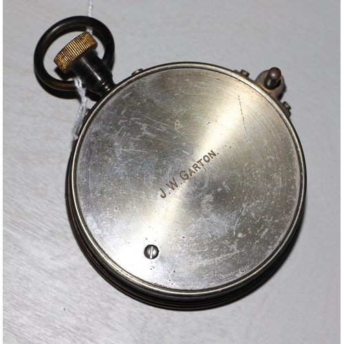 888 - A surveying aneroid compensated pocket barometer, by J H Steward, 8cm diameter.