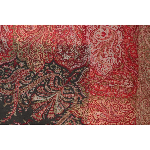 1999A - Three Kashmir Paisley throws, the largest approx 314 by 147cms; together with a linen throw; a flora... 