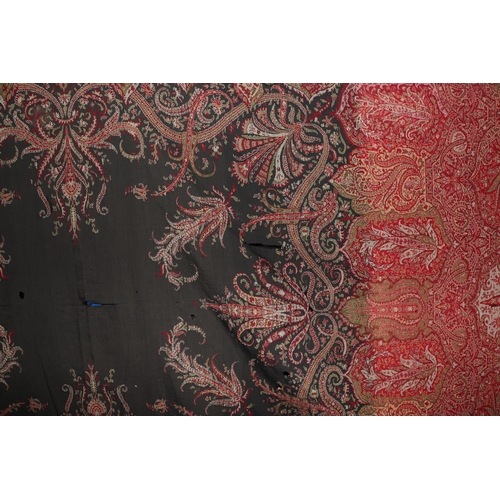 1999A - Three Kashmir Paisley throws, the largest approx 314 by 147cms; together with a linen throw; a flora... 