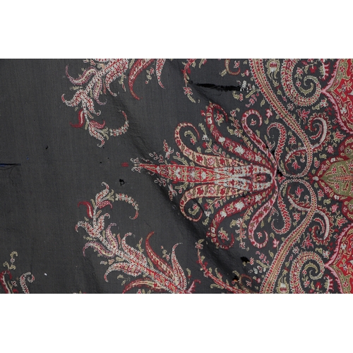 1999A - Three Kashmir Paisley throws, the largest approx 314 by 147cms; together with a linen throw; a flora... 