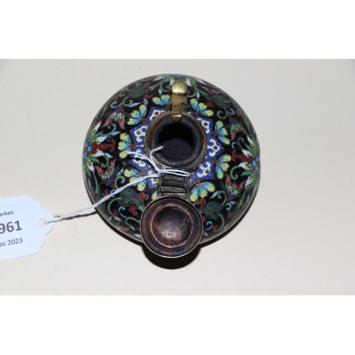 1961 - A Chinese cloisonné scholars inkwell, decorated flowers on a black ground, 9cm diameter