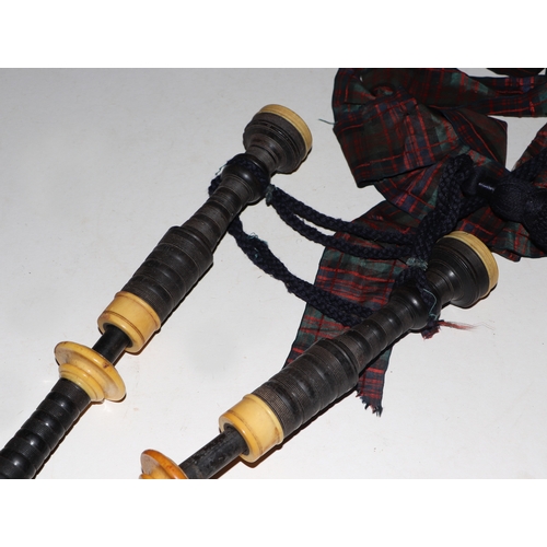 866 - A set of late 19th / early 20th century ivory and turned hardwood Scottish Highland bagpipes, with l... 