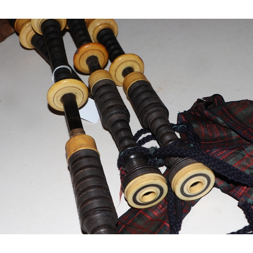 866 - A set of late 19th / early 20th century ivory and turned hardwood Scottish Highland bagpipes, with l... 